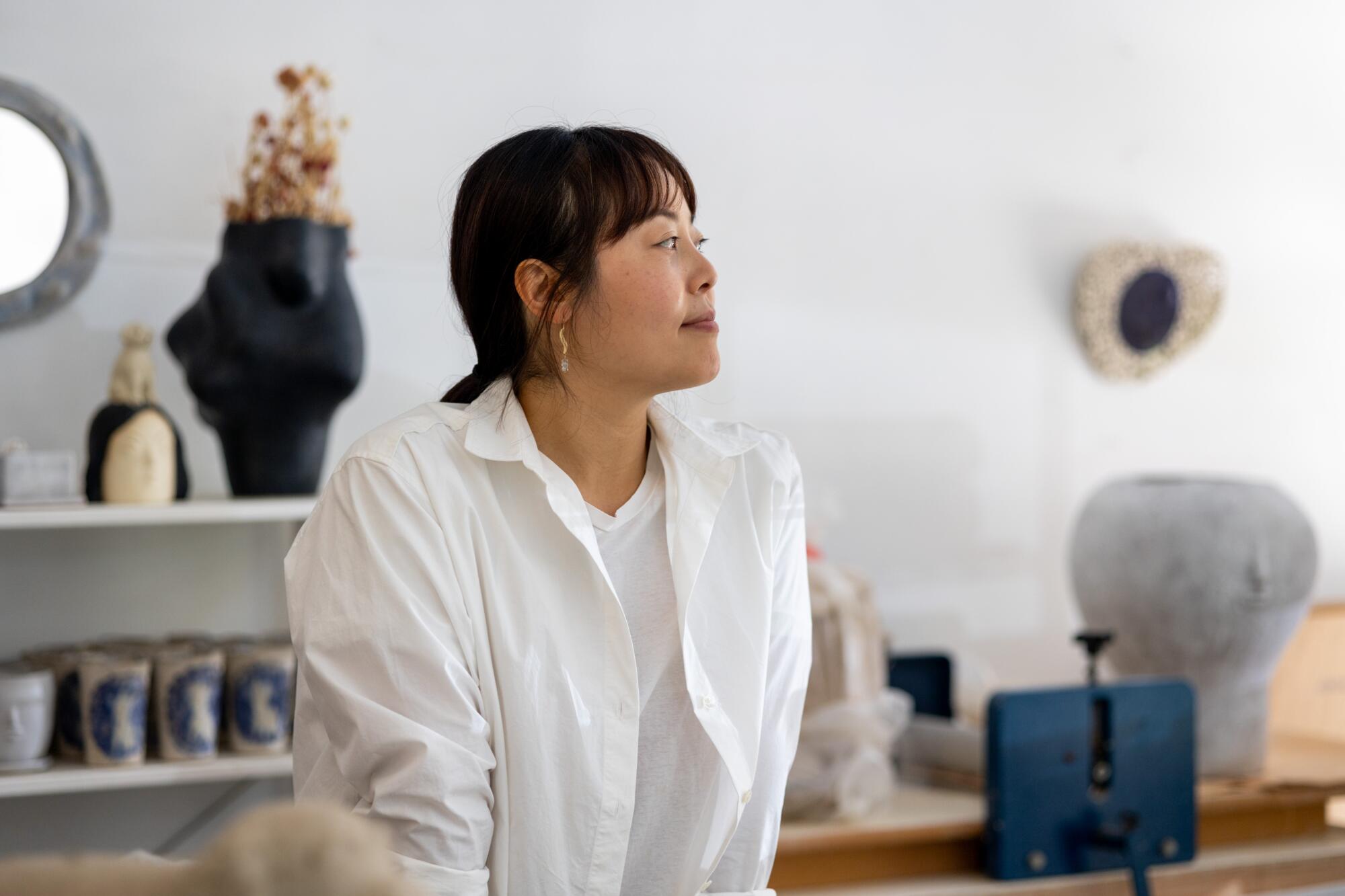 Ceramicist Rami Kim is seen at her studio 
