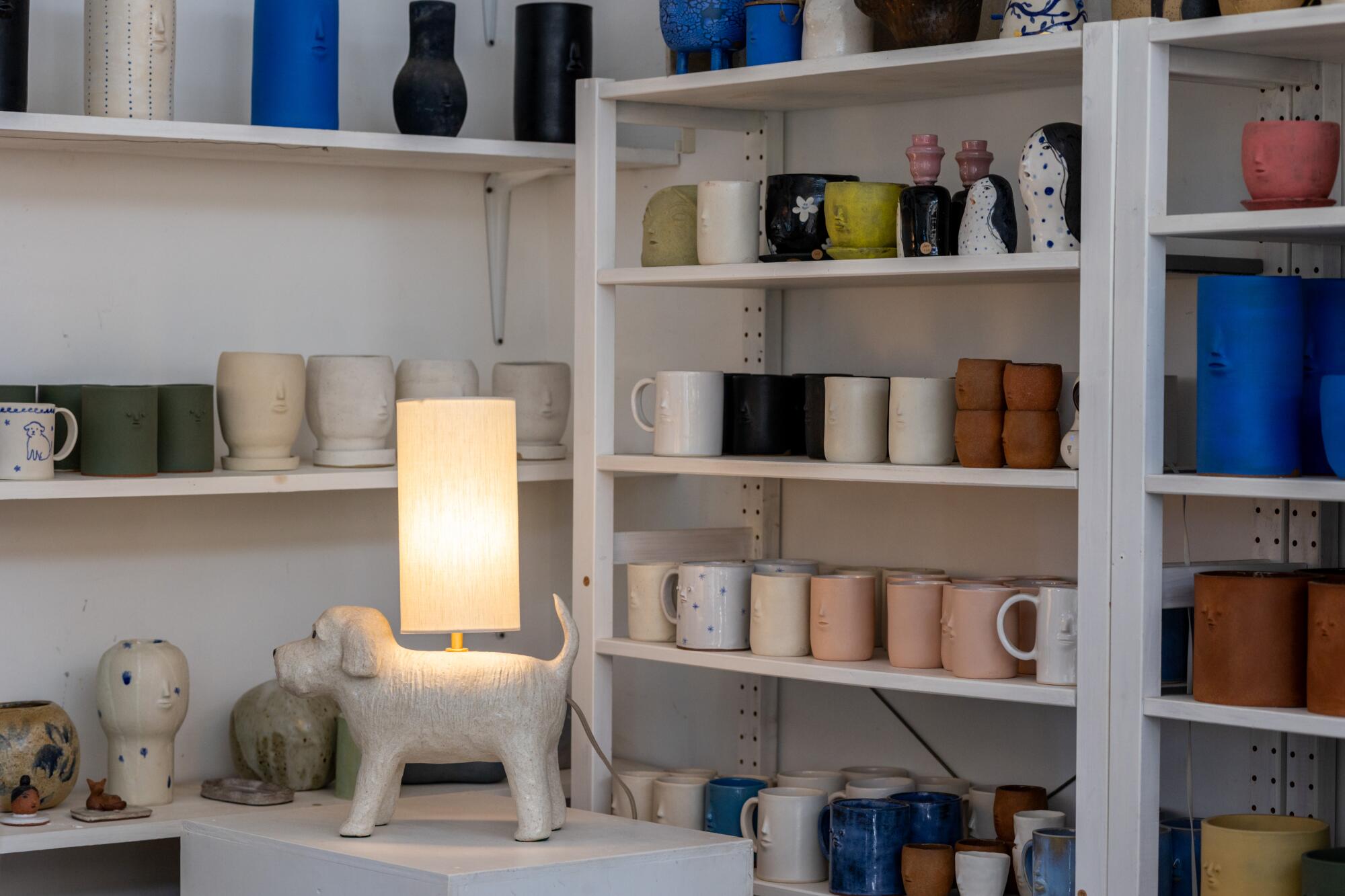 A lamp depicting ceramicist Rami Kim's dog Gus is displayed at her studio 