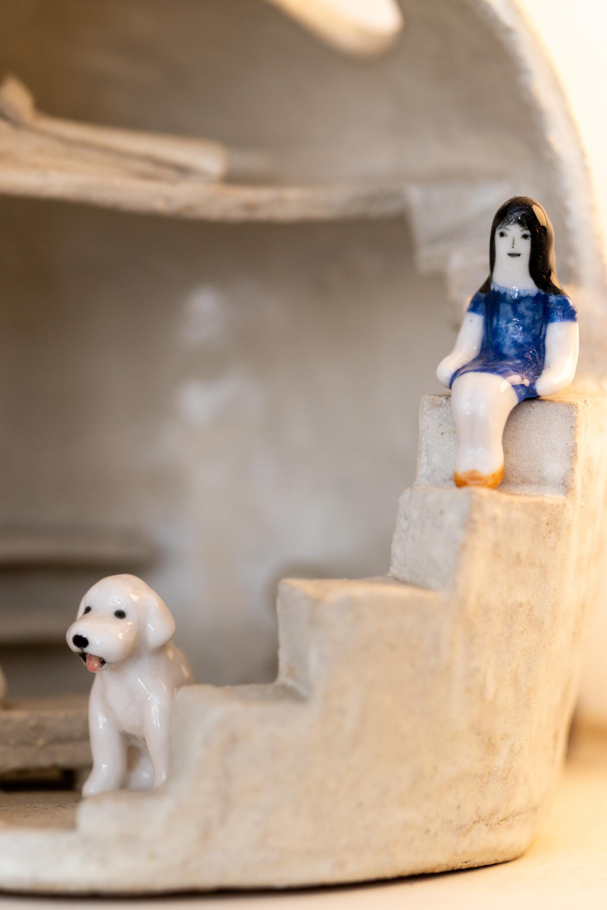  A ceramic home depicting Rami Kim and her dog Gus 