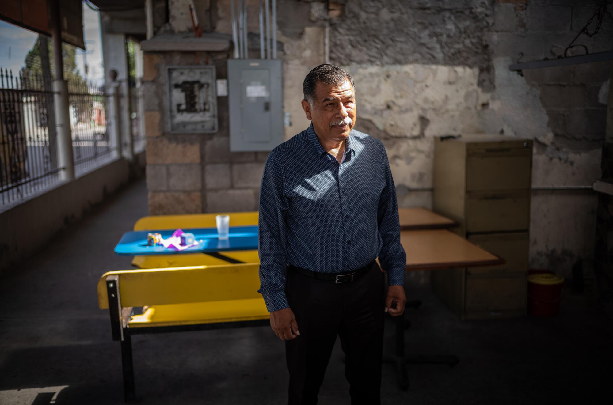 Pastor Francisco Gonzalez Palacios poses for a portrait at Albergue Vida