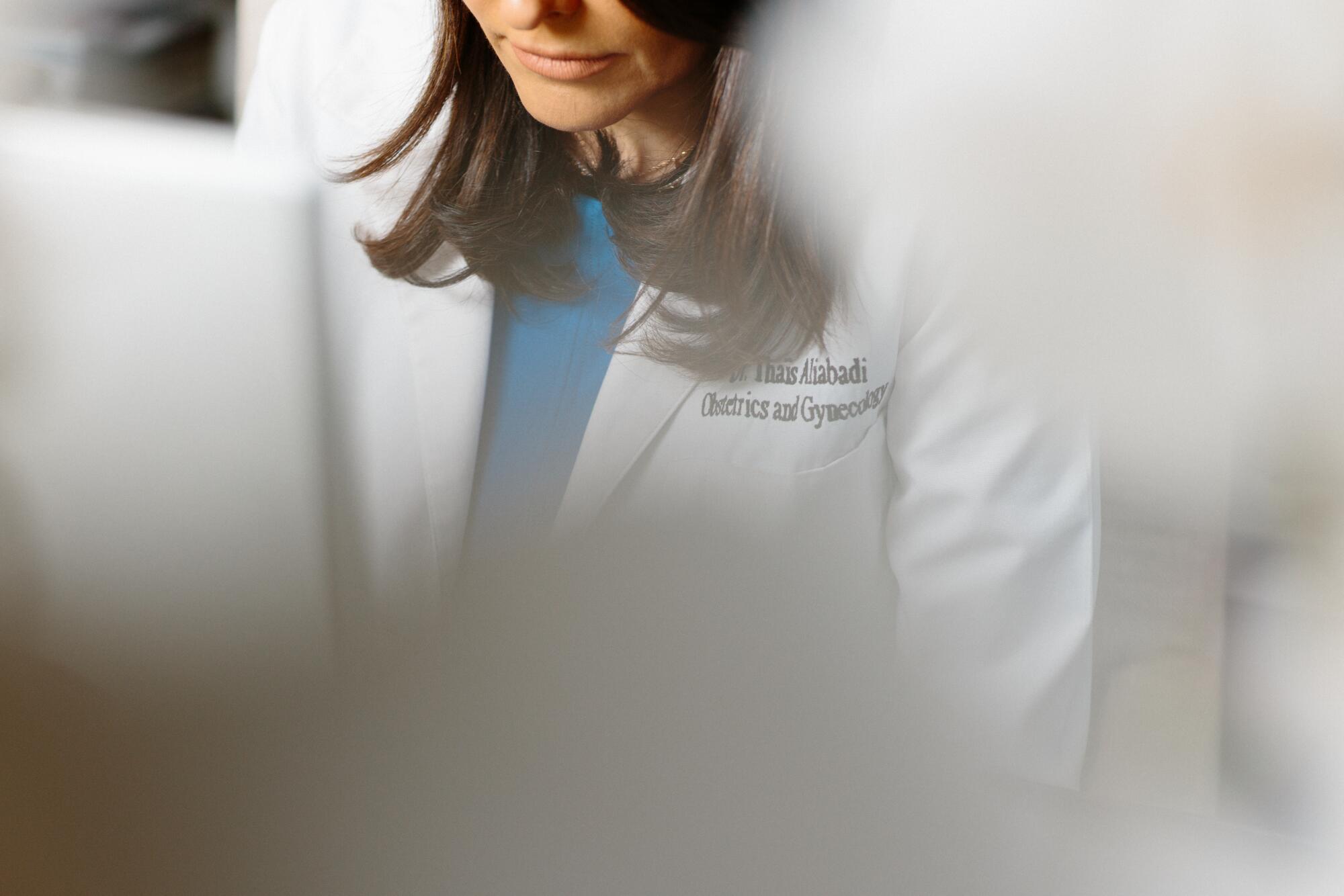 Dr. Thaïs Aliabadi reviews patient's labs.