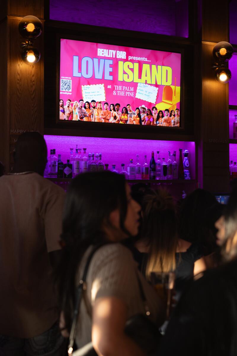 Fans wait for the "Love Island USA" watch party at the Palm and the Pine in Hollywood