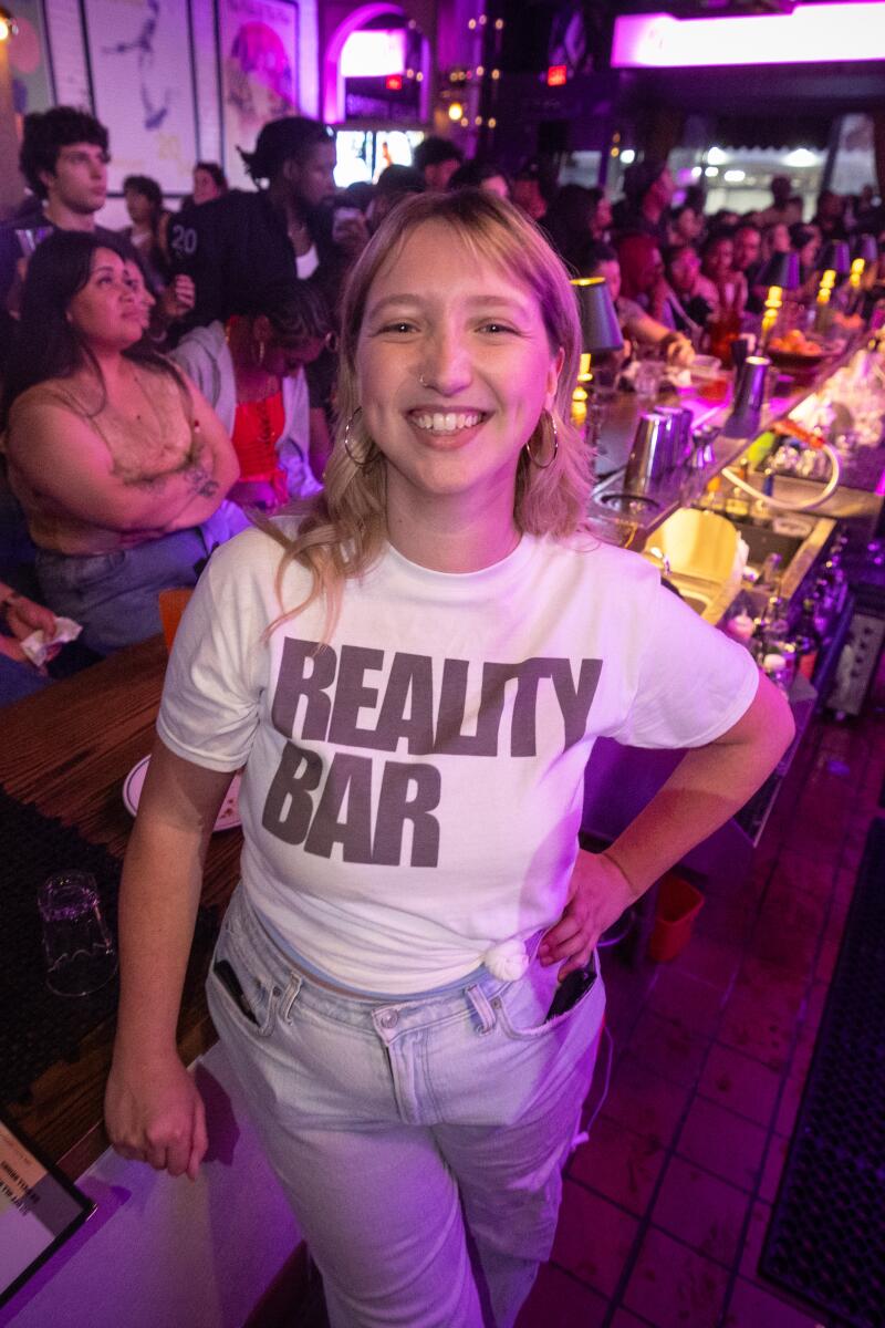 Madeline Biebel, creator of Reality Bar a Watch Party Series, at her "Love Island USA" watch party at the Palm & the Pine.