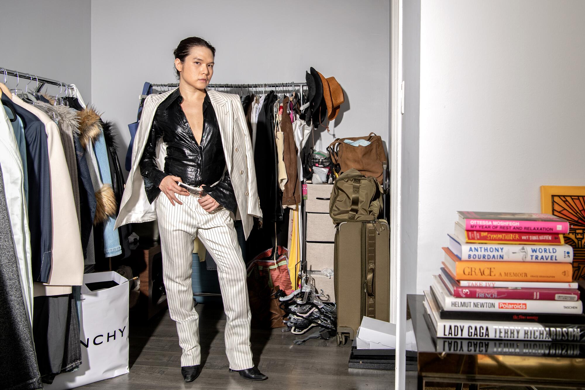Bin wears Tom Ford suit jacket and pants, vintage Gucci by Tom Ford shirt and belt, Dora Teymur boots.