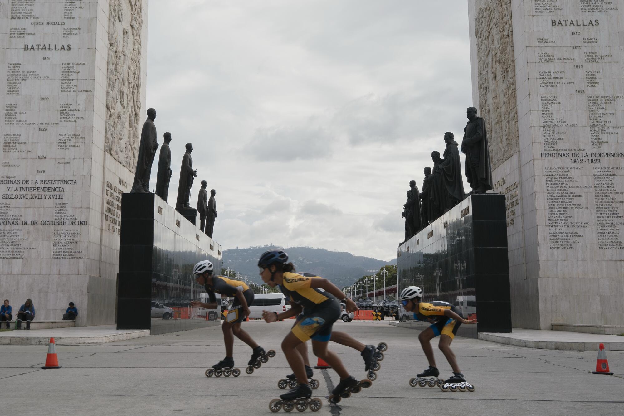An all-girls skating team skates at Los Próceres near the Fuerte Tiuna military base in Caracas.