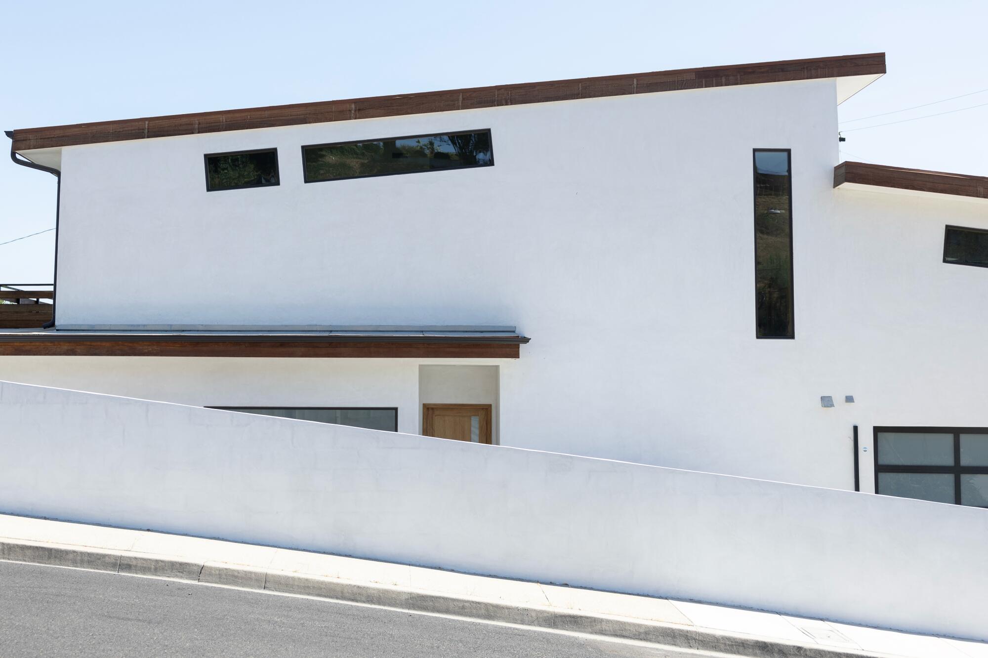A new, modern house with a slanted roof in Monterey Park.