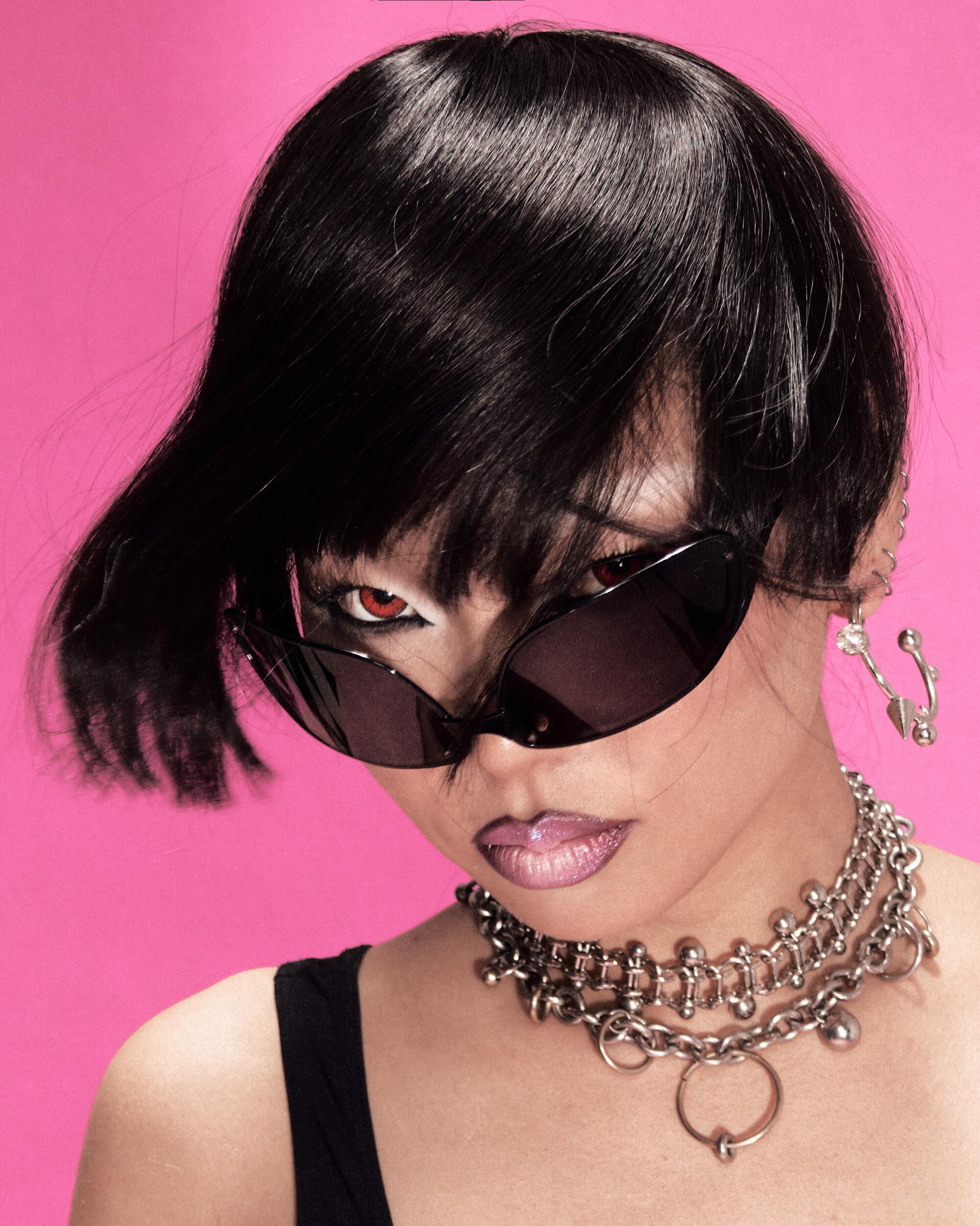 Acne Studios sunglasses from Rocotito Archives, Justine Clenquet jewelry.