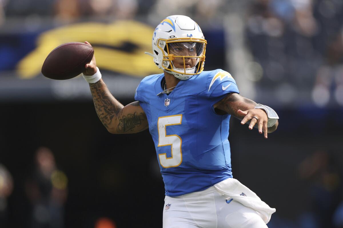 Chargers quarterback Trey Lance passes during the second half Sunday.