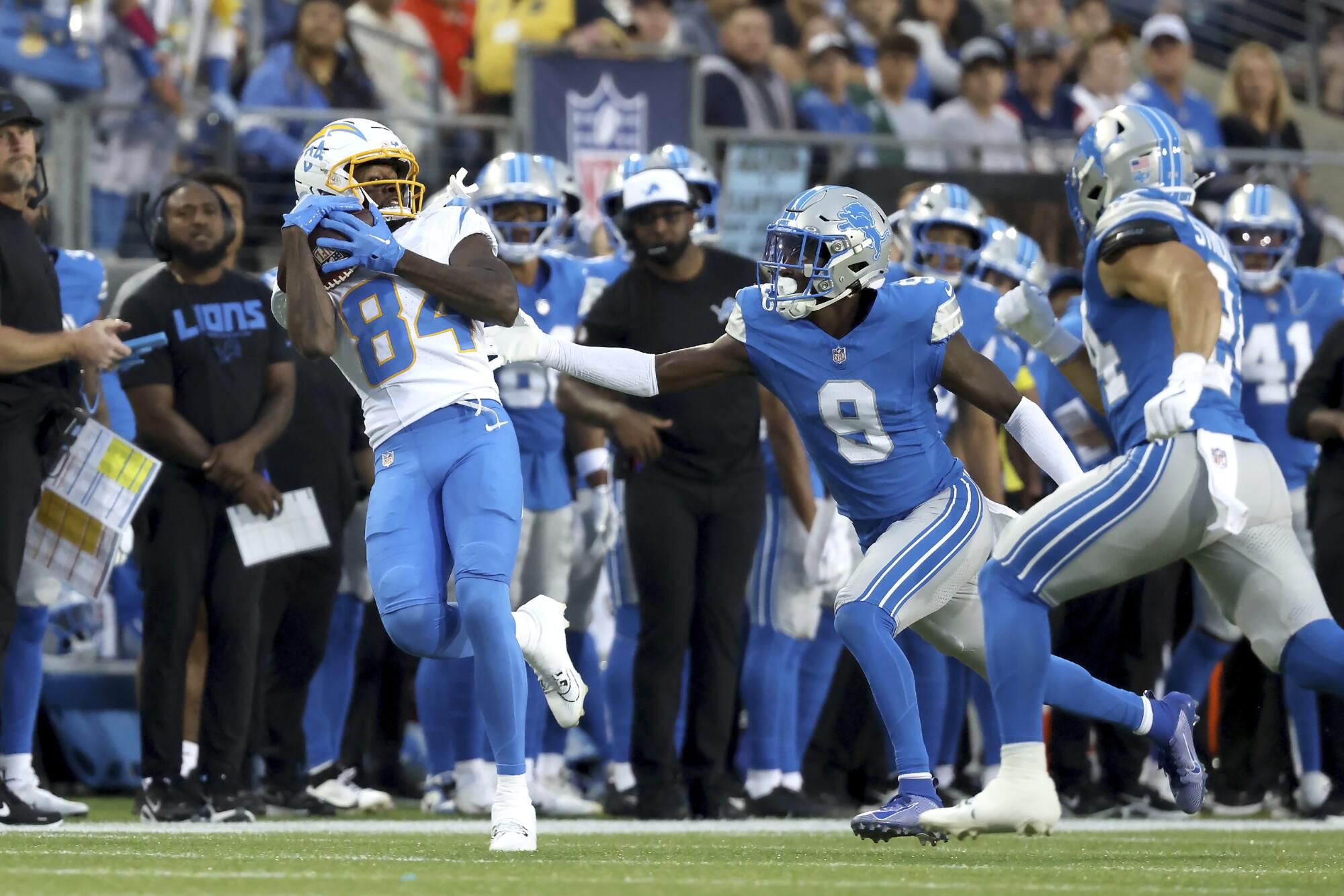Chargers receiver KeAndre Lambert-Smith catches a pass during a preseason game against the Detroit Lions on July 31.