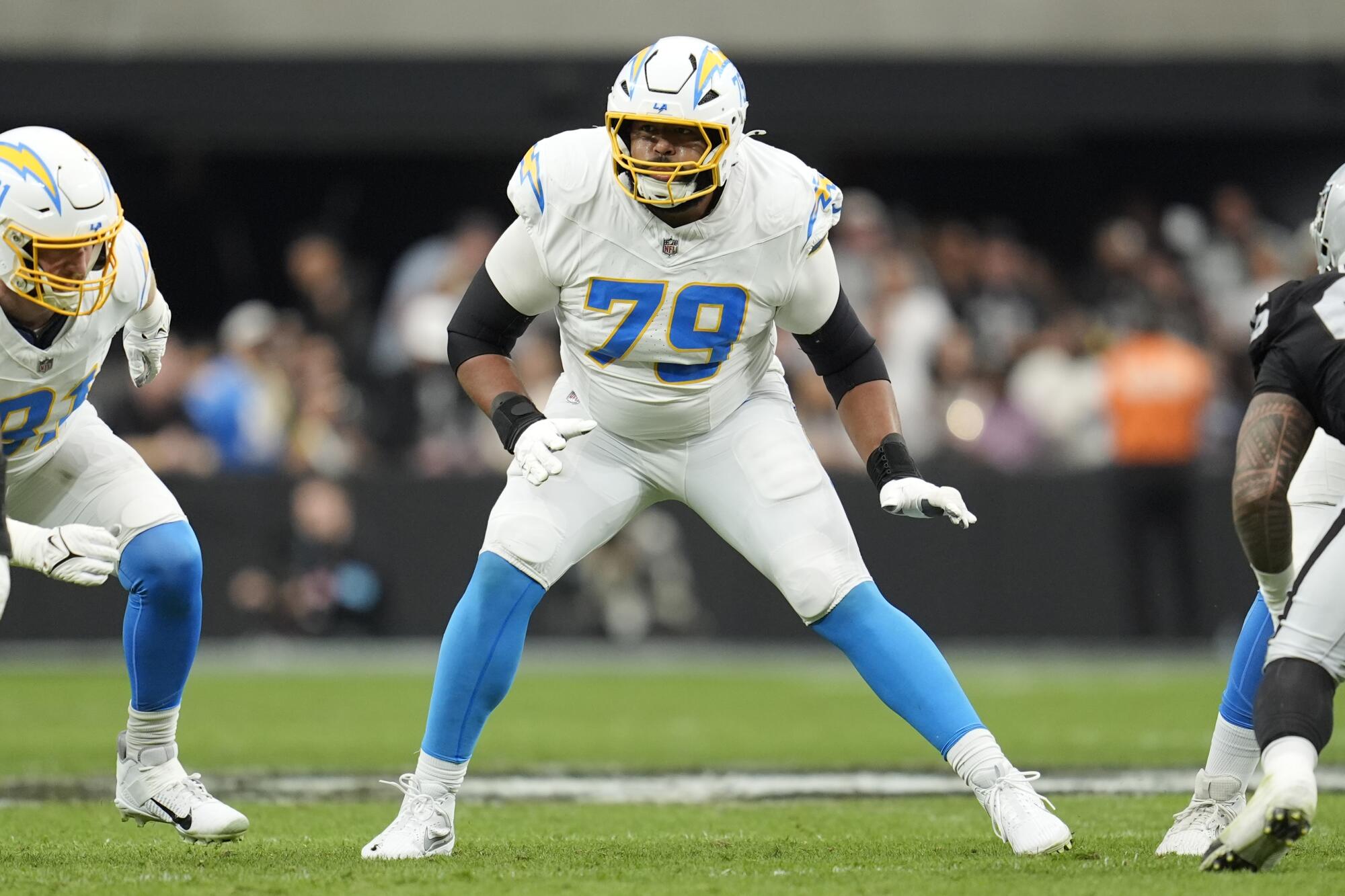 Chargers tackle Trey Pipkins III lines up to block during a game against the Las Vegas Raiders on Jan. 5.