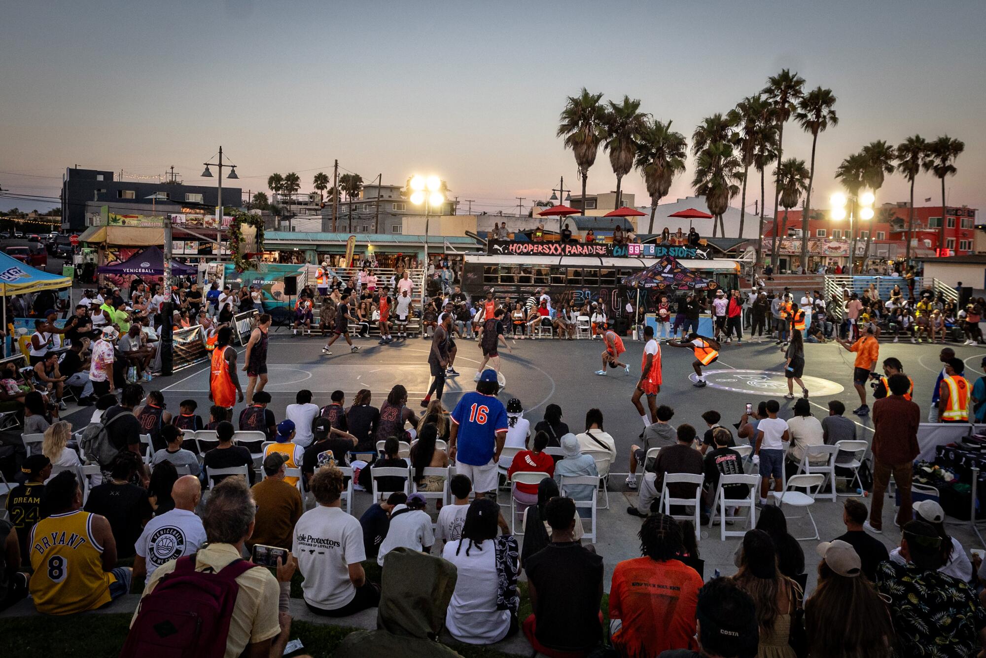 Players compete during the final game of the Veniceball "Legends Weekend" at Venice Beach on Sunday.
