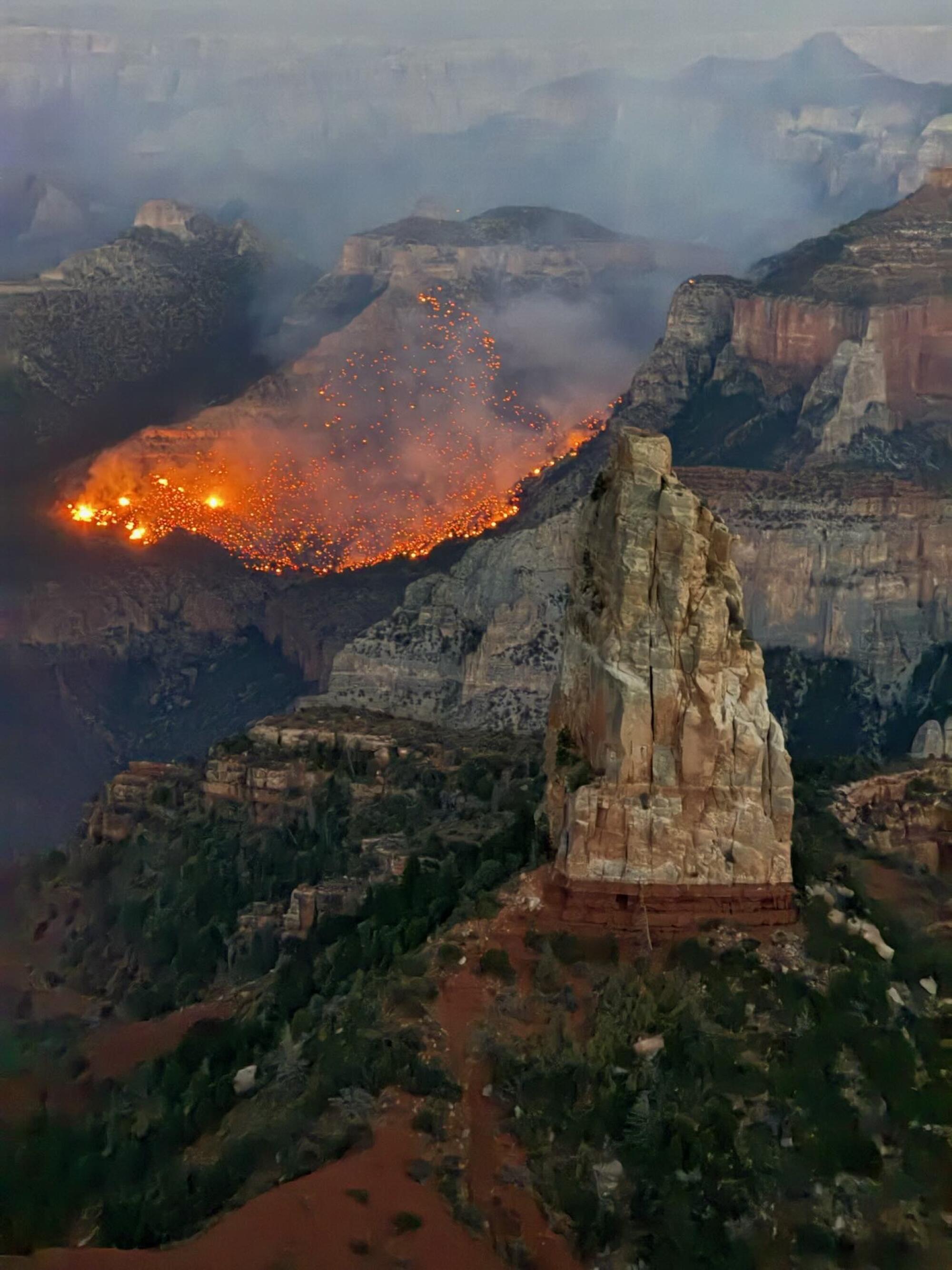 The Dragon Bravo fire burns in this photo supplied by Santa Fe National Forest Engine 651.