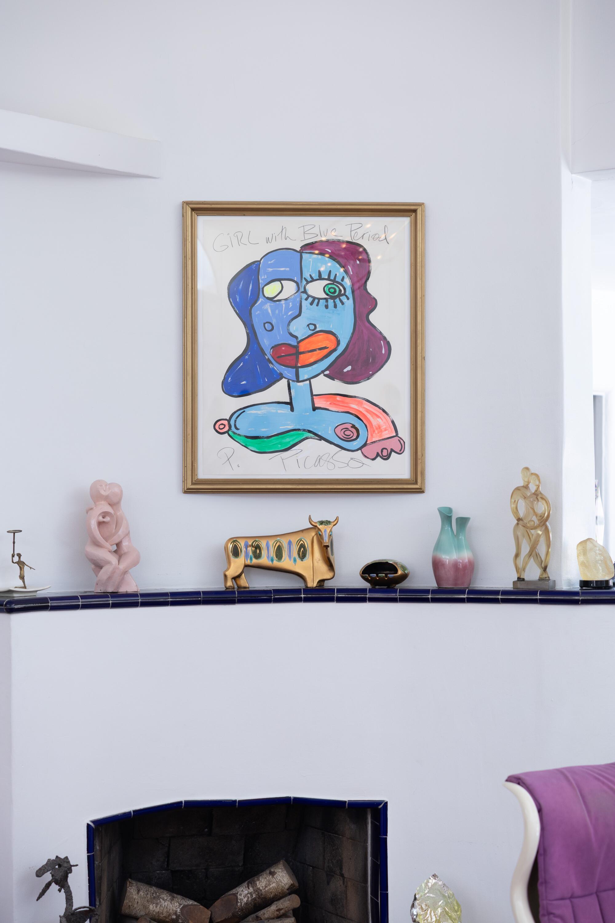 A tongue-in-cheek faux-Picasso hangs above the fireplace.