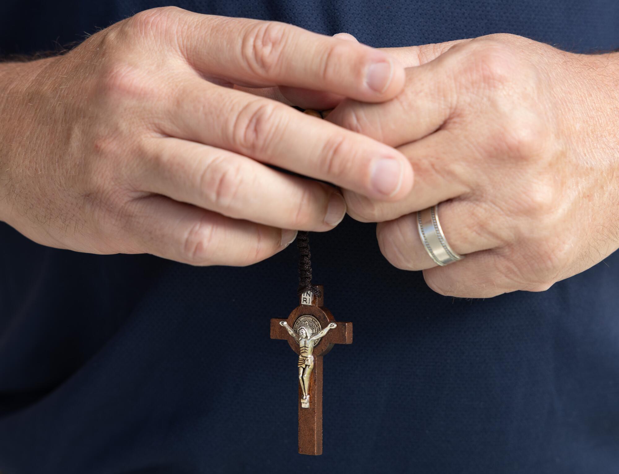Delgado said his rosary and prayers were important to surviving the fires.