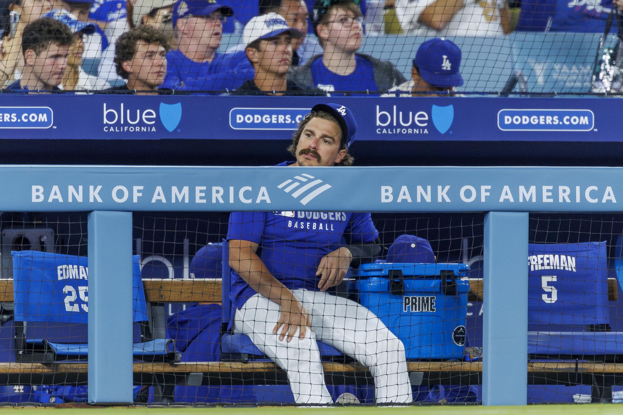 Dodgers utility player Kiké Hernández watches from the dugout during a game against the San Diego Padres on Aug. 15.