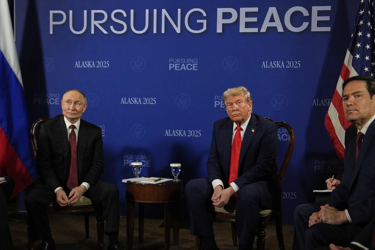 President Trump meets with Russia's President Vladimir Putin. Secretary of State Marco Rubio sits to the side of Trump.