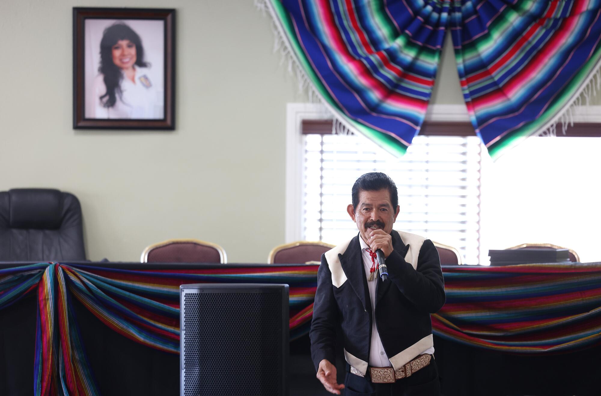 Juan Mascorro sings for the reunited families.