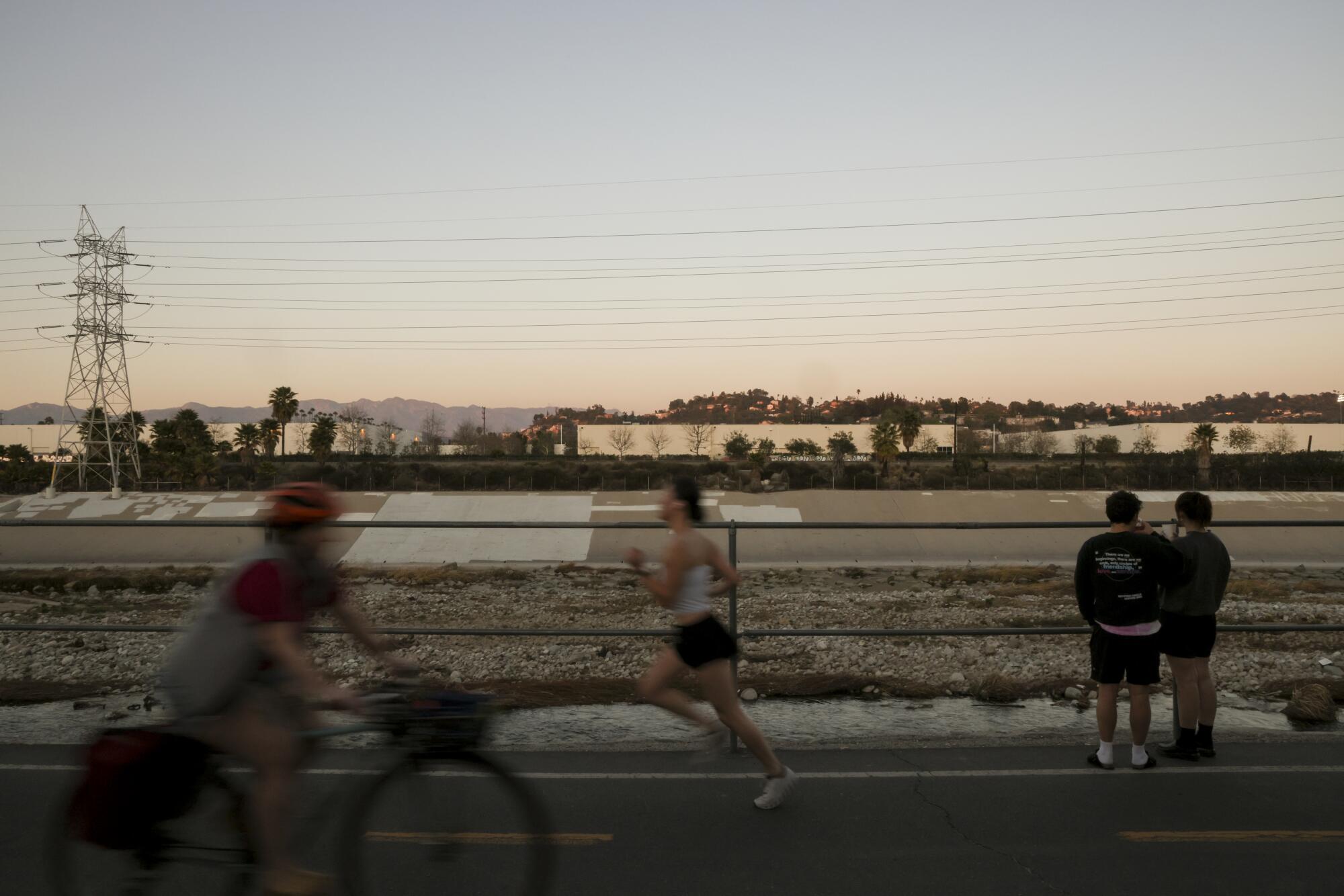 Pedestrians use the Los Angeles River Bikeway.