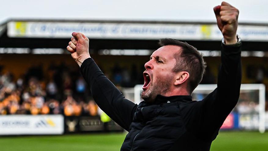 Charlton manager Nathan Jones celebrates