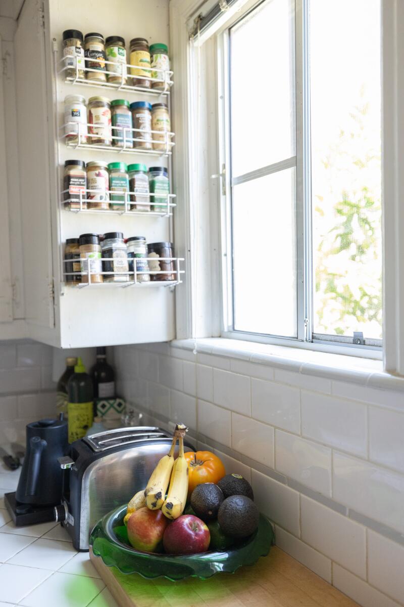 Decorative tiles and spices in a kitchen.