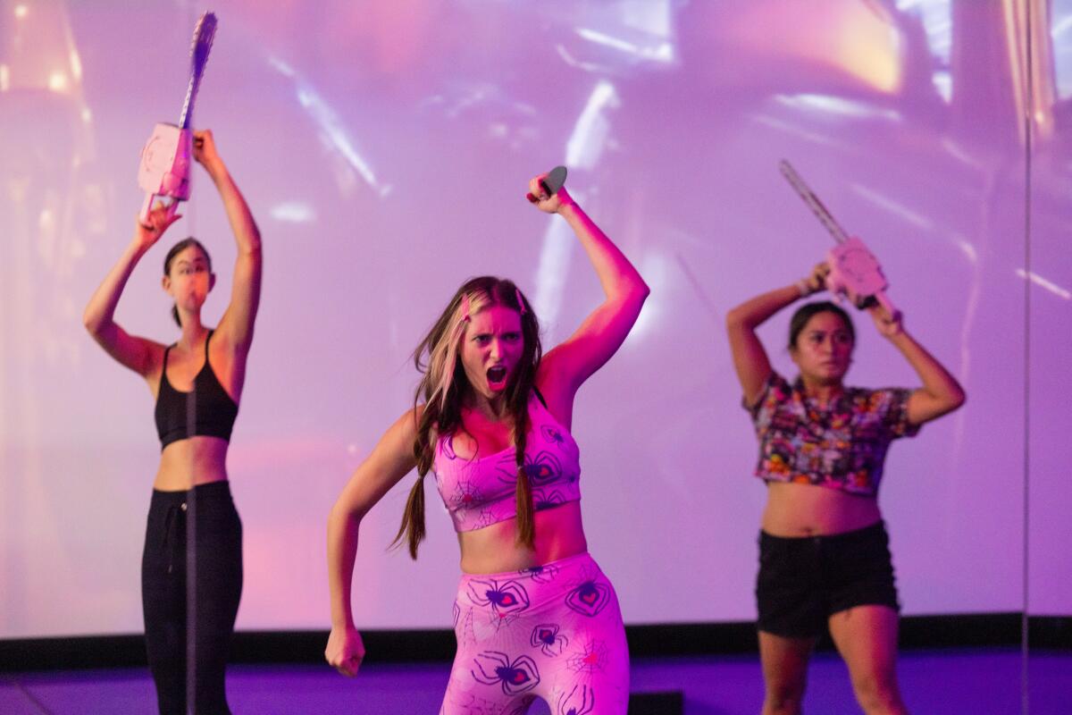 Angel Strong, Nadia Teichmann and Aimee Torres take the "Slashercise" class at Killer Fitness.