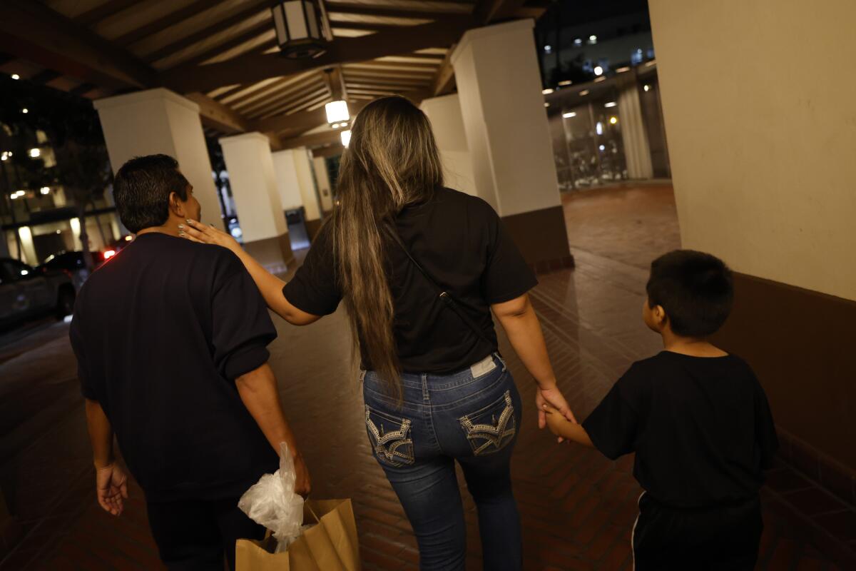 Angel Minguela Palacios with his partner of eight years and their 6-year-old son.
