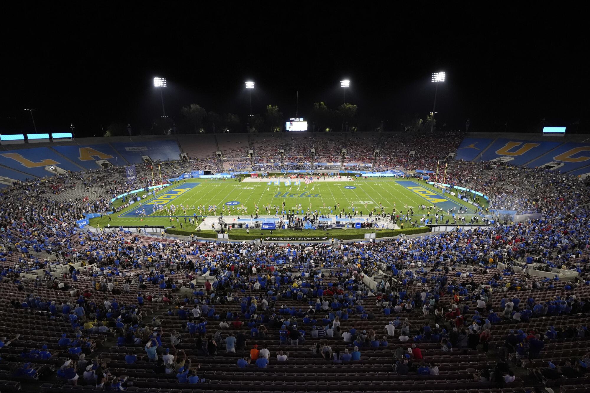 Fans attend the UCLA season opener against Utah at the Rose Bowl on Aug. 30.