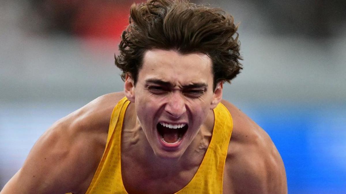 Armand Duplantis celebrates after breaking the world record in Tokyo