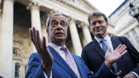 EPA/Shutterstock Reform UK leader Nigel Farage and Reform UK deputy leader Richard Tice speak to the media outside the Bank of England