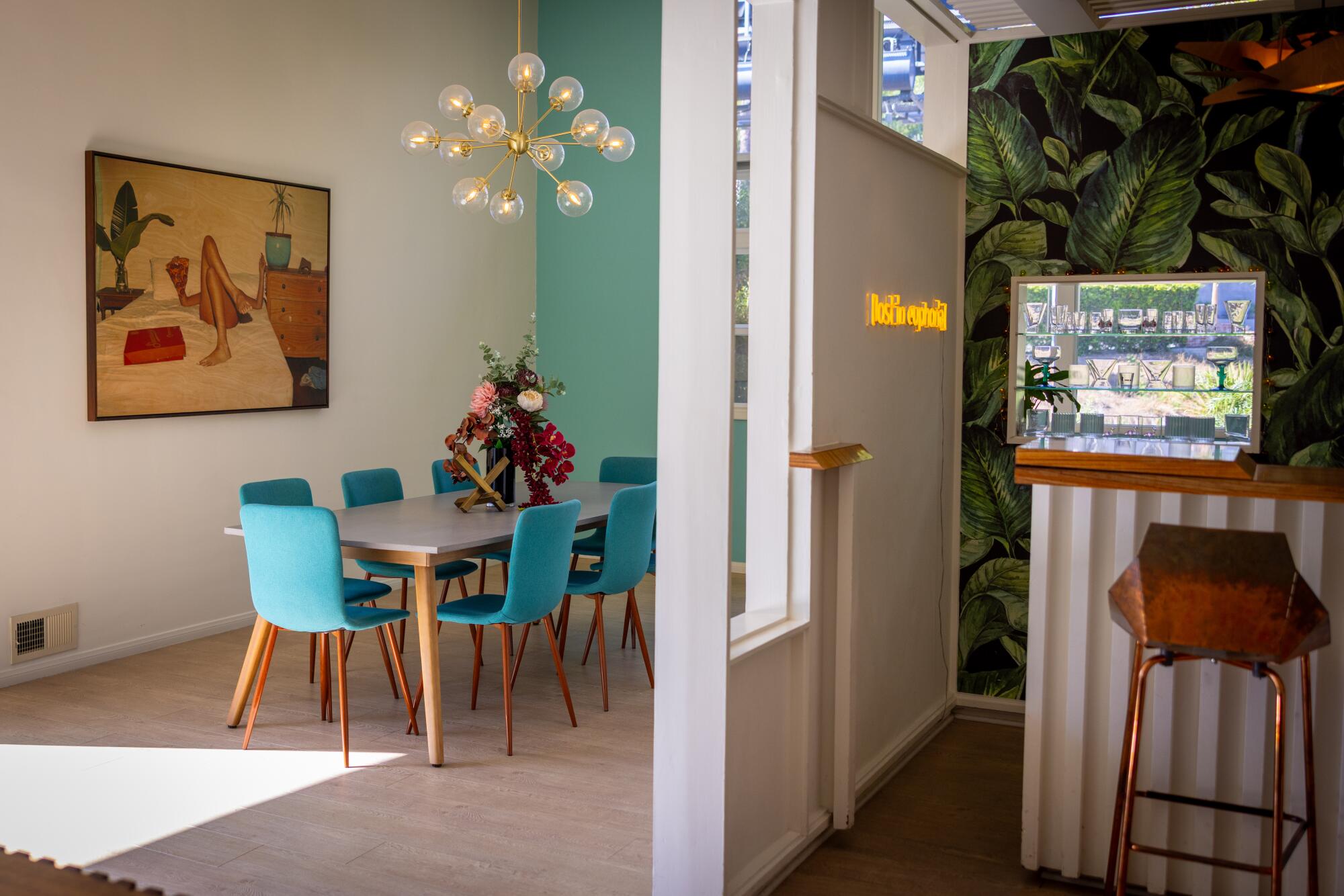 A dining room and wet bar.