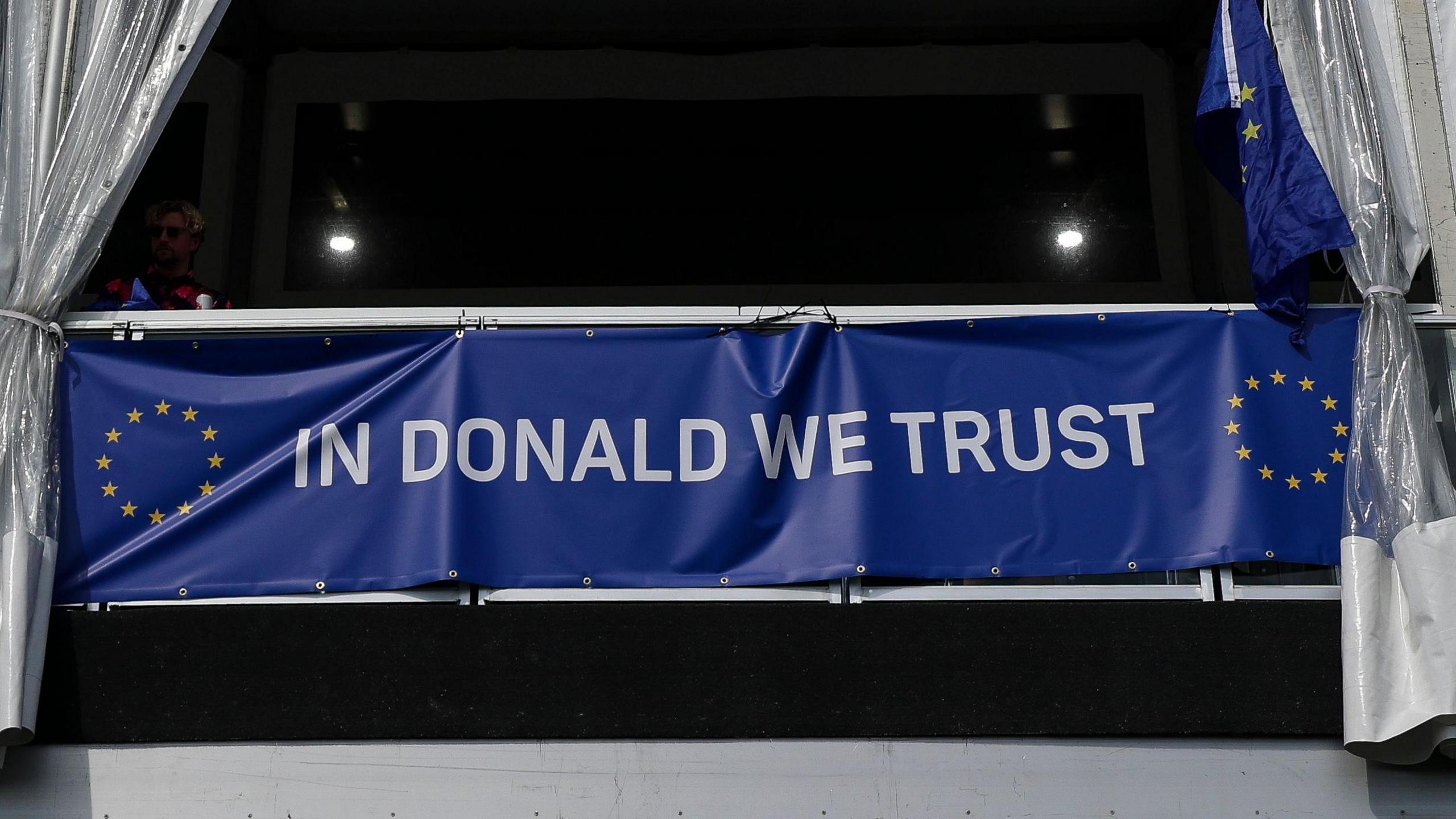 'In Donald We Trust' flag at Bethpage