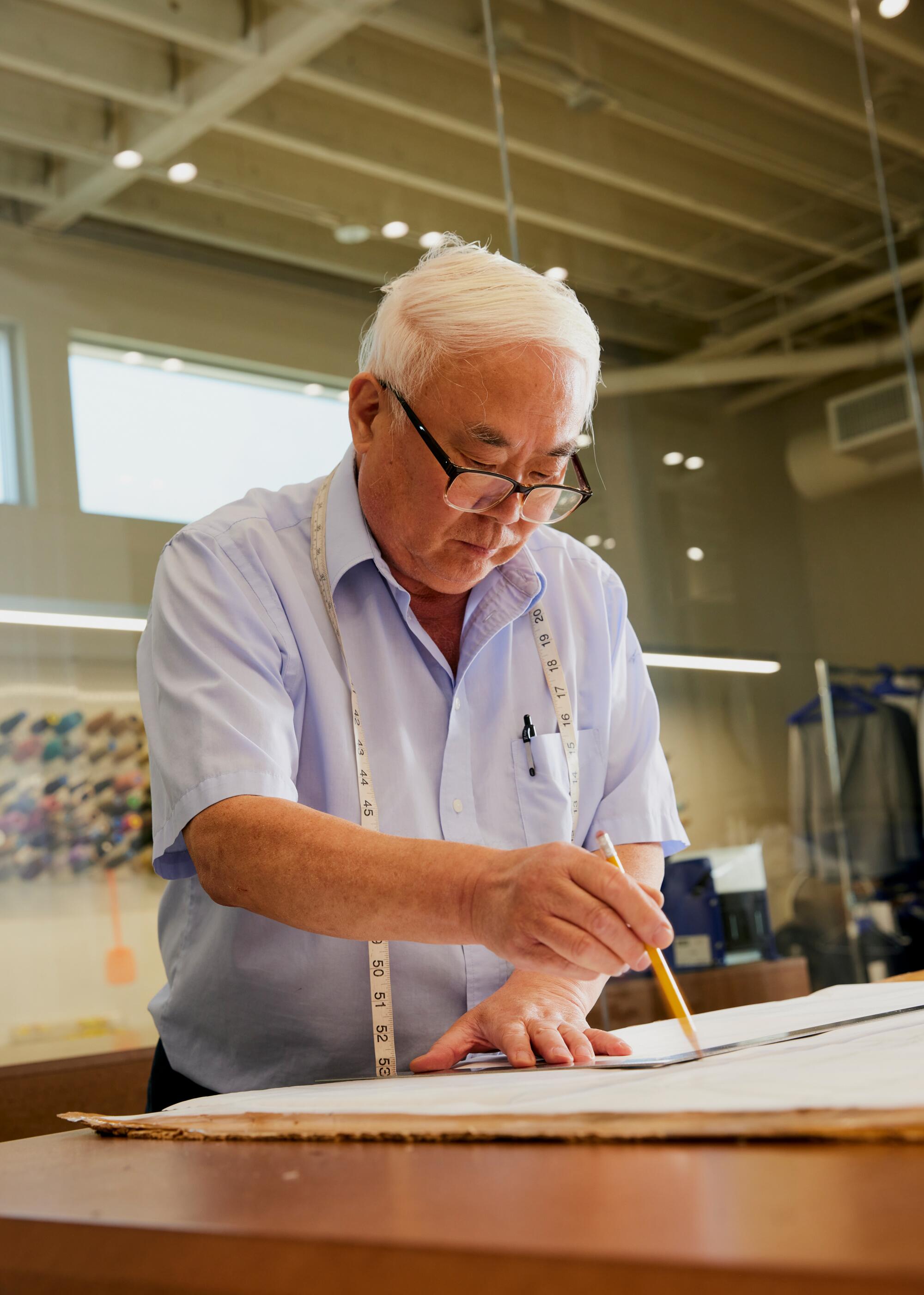 Mr. Han, High Society’s master cutter, was first hired by Lim‘s father 36 years ago.