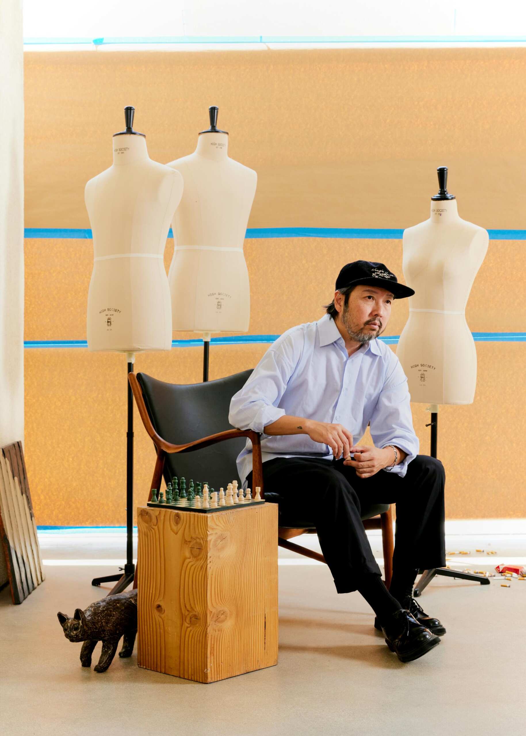 David wears High Society outfit, Zakka Bakka hat and Adieu shoes.