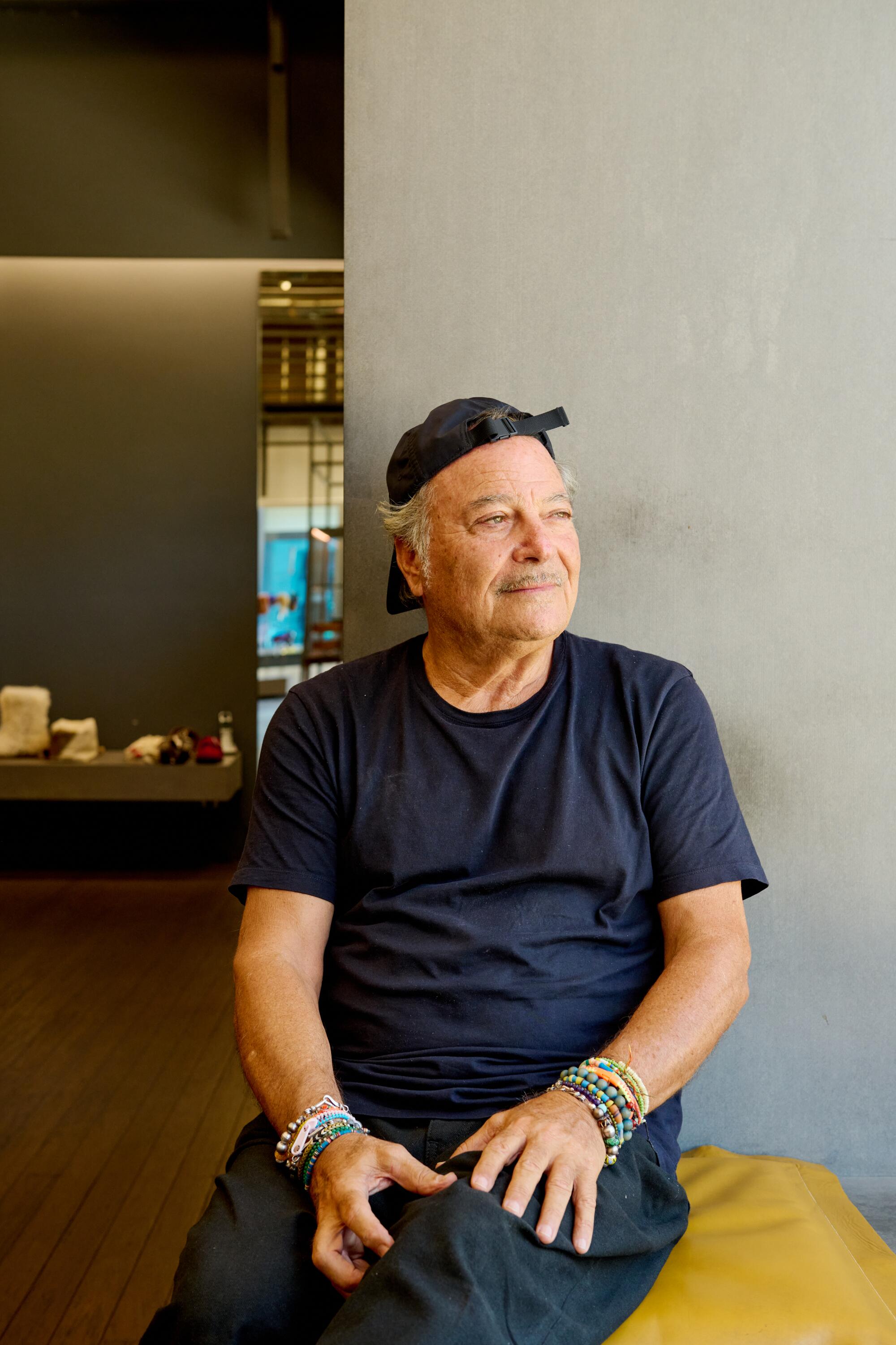 Lorenzo Hadar, founder and owner, wears Muji Lab jeans, Club Monaco T-shirt.