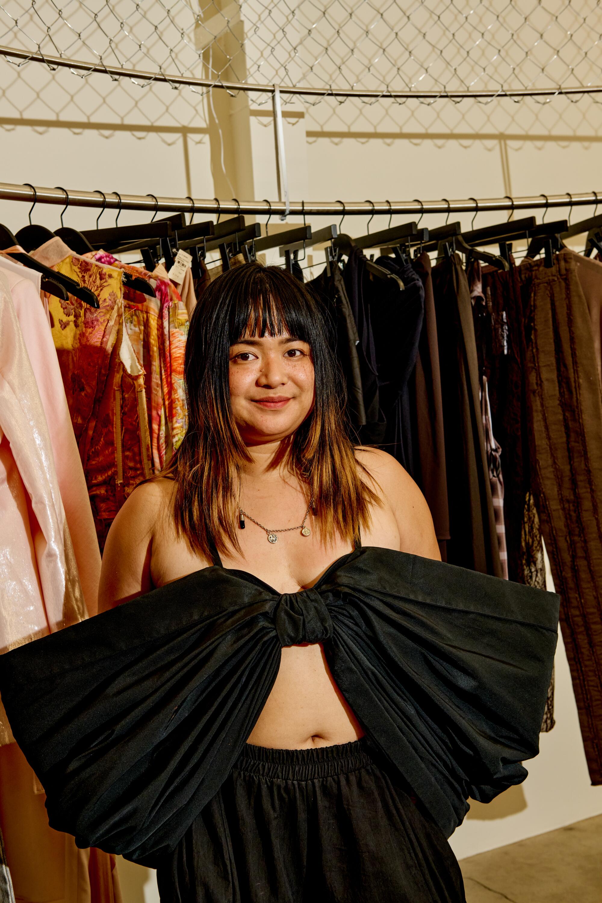 Aria Daniella Clemente, wears Ambush necklace, Nina Ricci by Harris Reed top, thrifted bottoms.