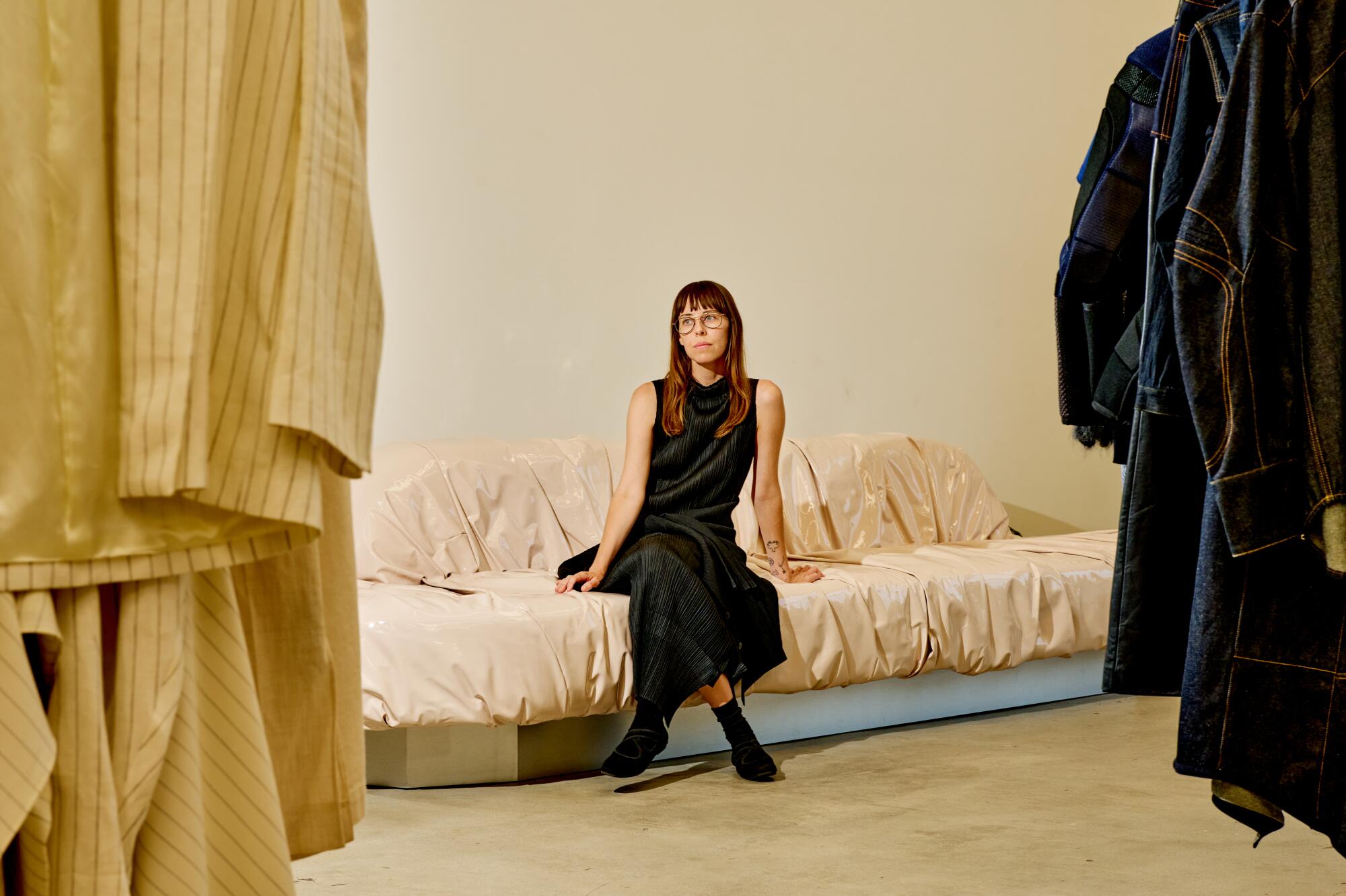 Katy Shayne, content director, wears Issey Miyake dress, Rachel Comey jacket and Hopp Studios shoes.