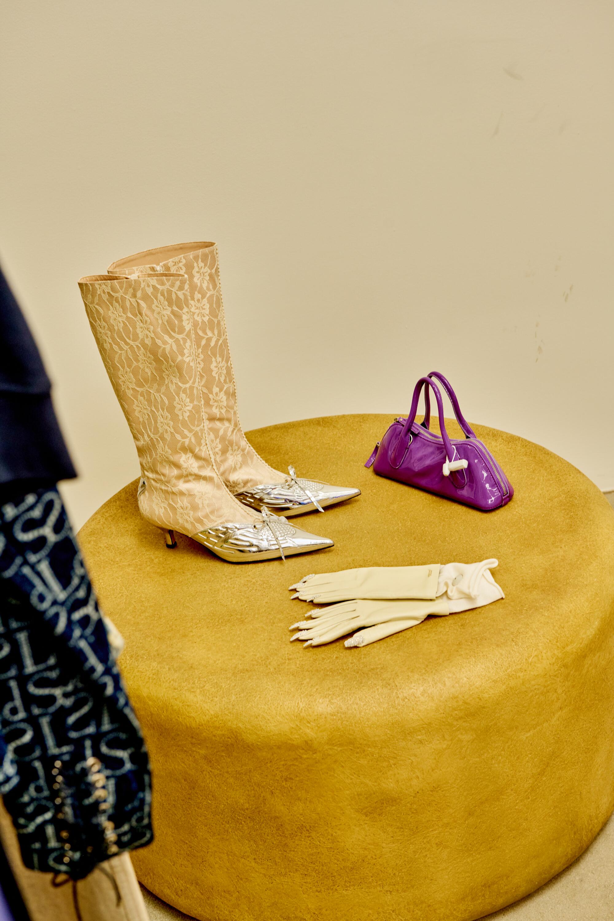 Invasive Modification boots, Blumarine bag, Undercover gloves
