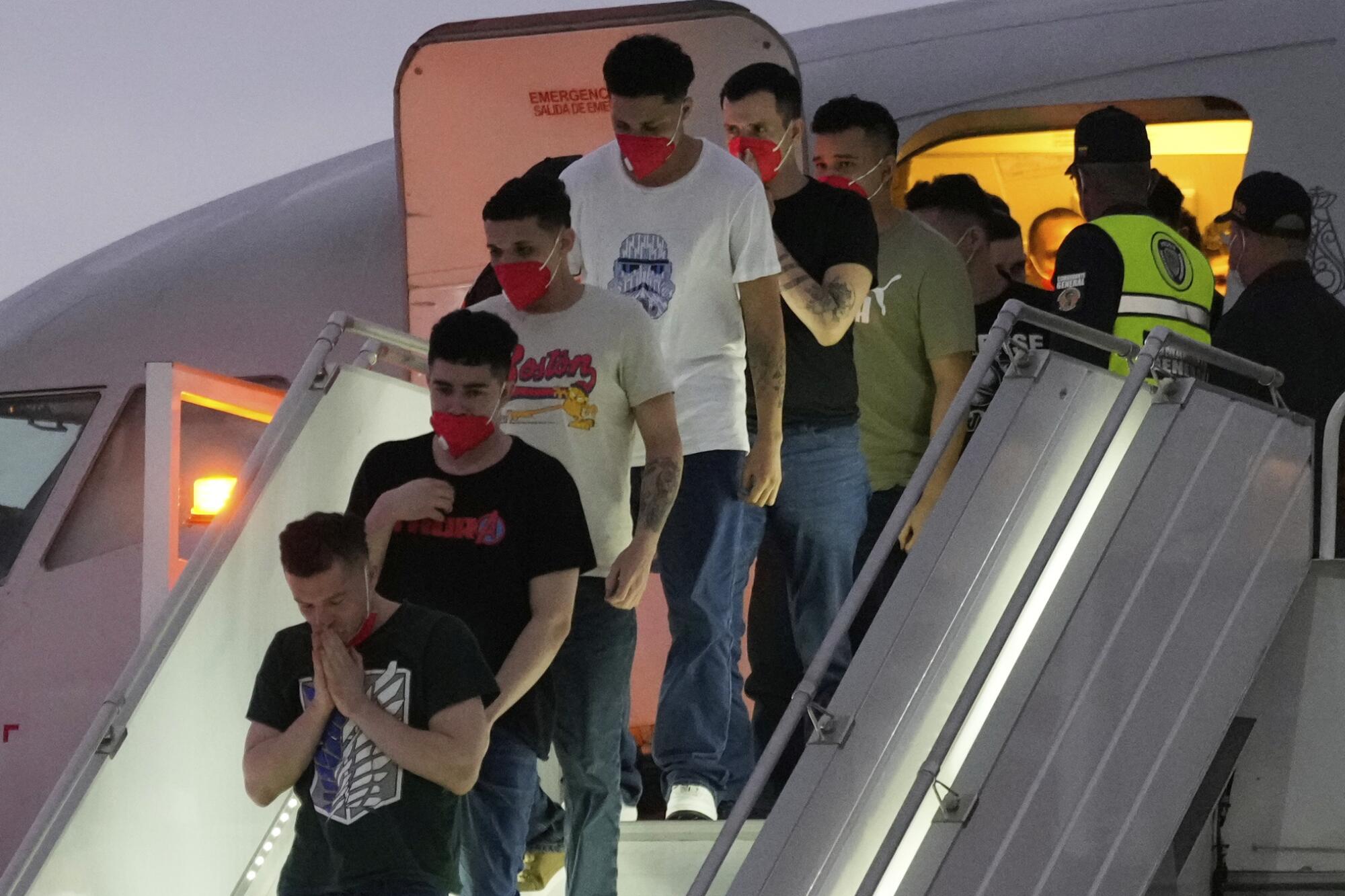 Migrants arrive at Simon Bolívar International Airport in Maiquetia, Venezuela