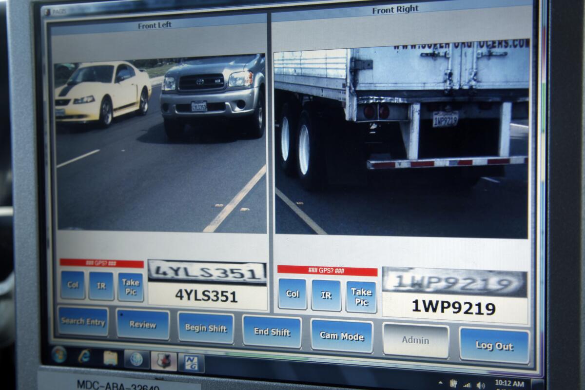 A patrol car with a license plate scanner