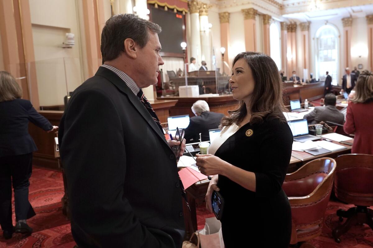 State Sen. Rosilicie Ochoa Bogh, shown with Senate Republican Leader Scott Wilk in 2022.