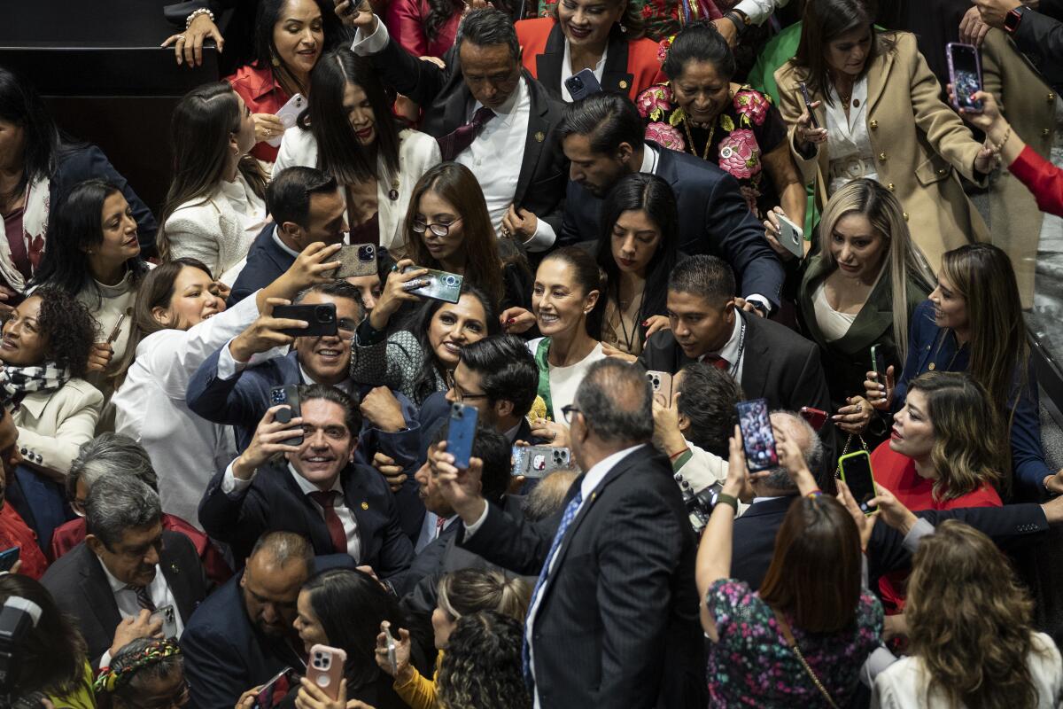 Supporters take selfies with the new President of Mexico, Claudia Sheinbaum