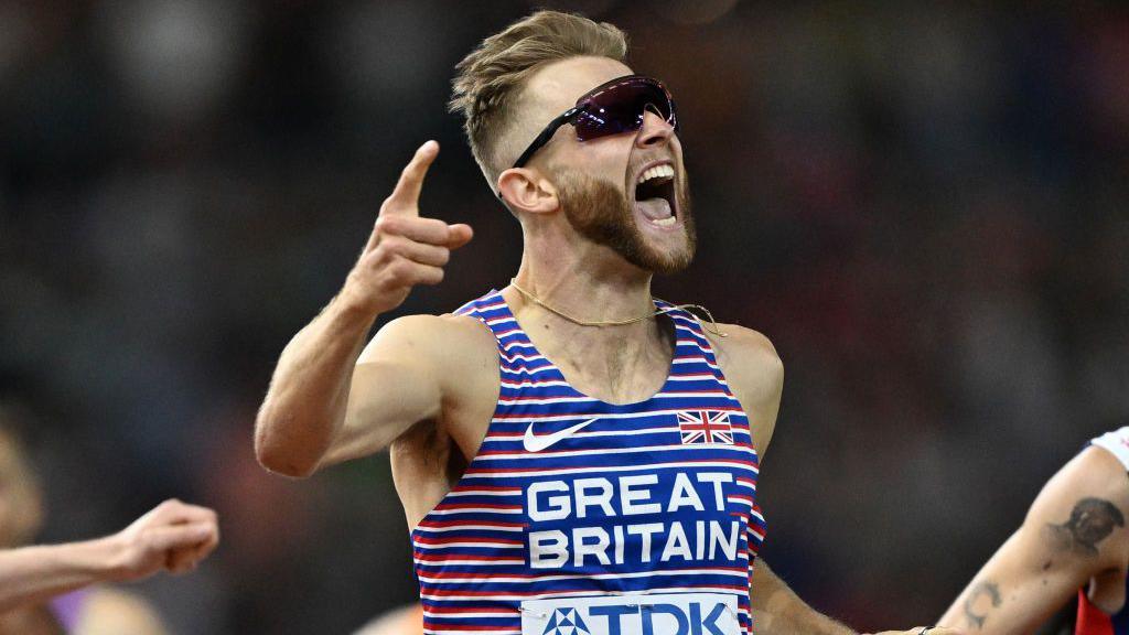 Josh Kerr celebrates his World Championships victory in 2023