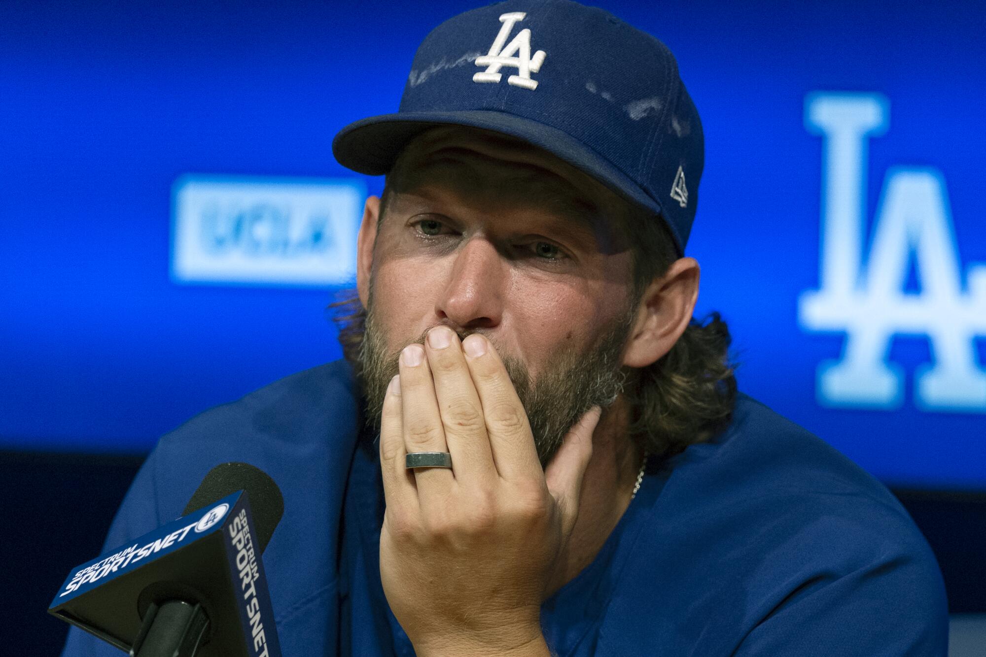 Dodgers pitcher Clayton Kershaw gets emotional Thursday. while announcing he will retire from baseball.