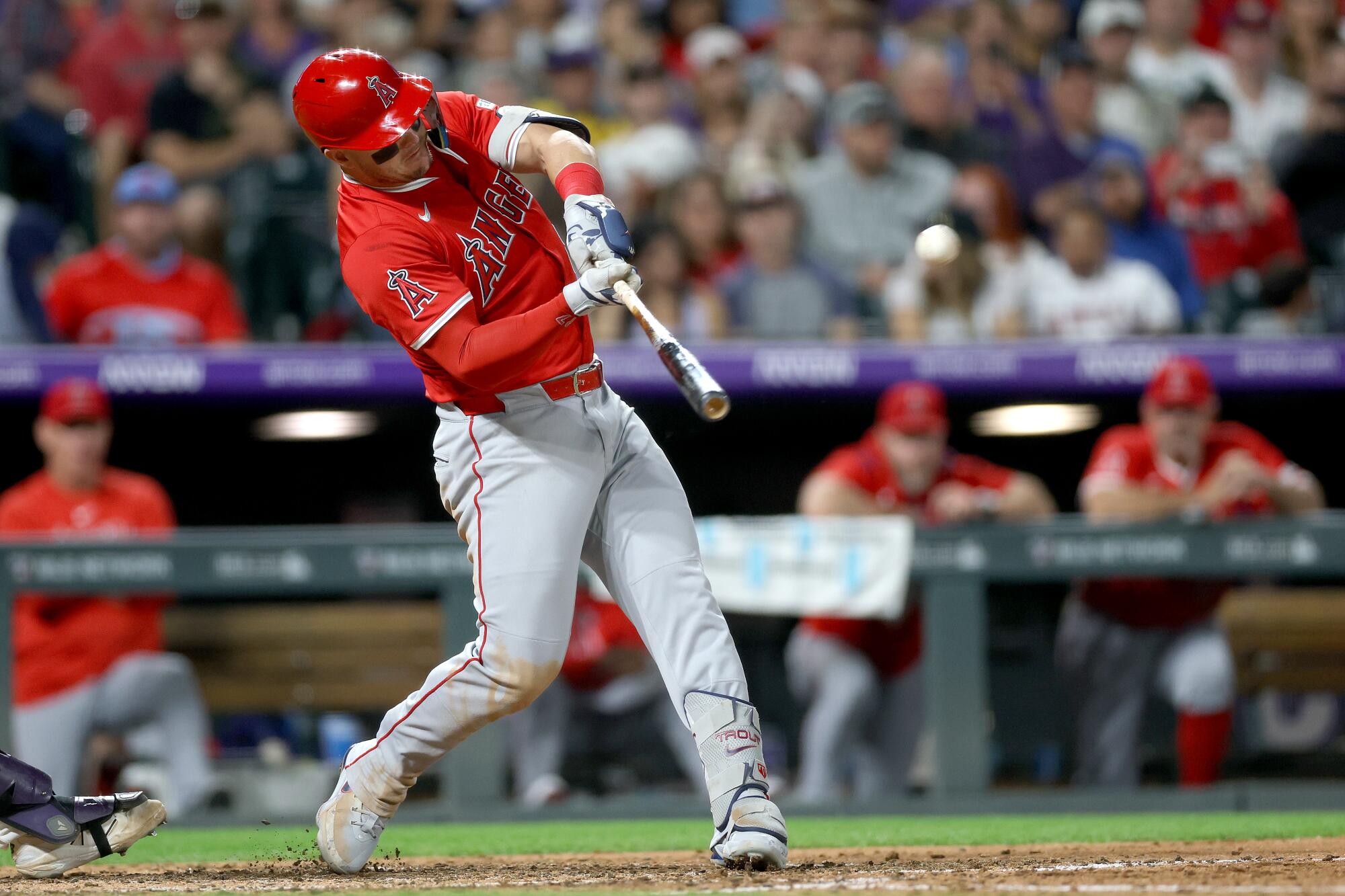 DENVER, COLORADO - SEPTEMBER 20: Mike Trout #27 of the Los Angeles Angels hits.