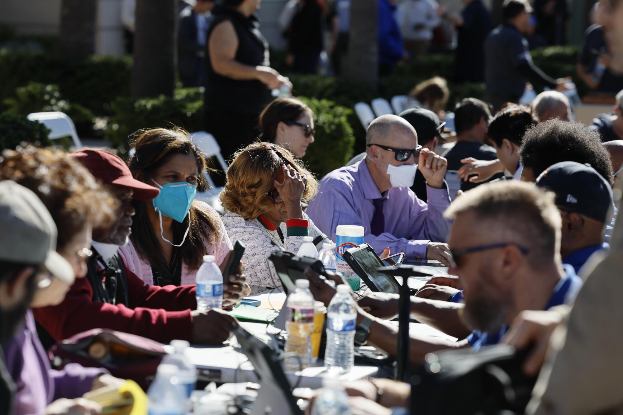 Wildfire victims seek disaster relief services at one of two FEMA Disaster Recovery Centers in Pasadena.