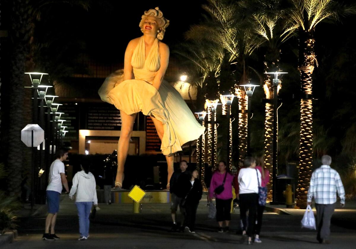 The "Forever Marilyn" statue towers over visitors who attend the weekly Palm Springs Villagefest along Museum Way.