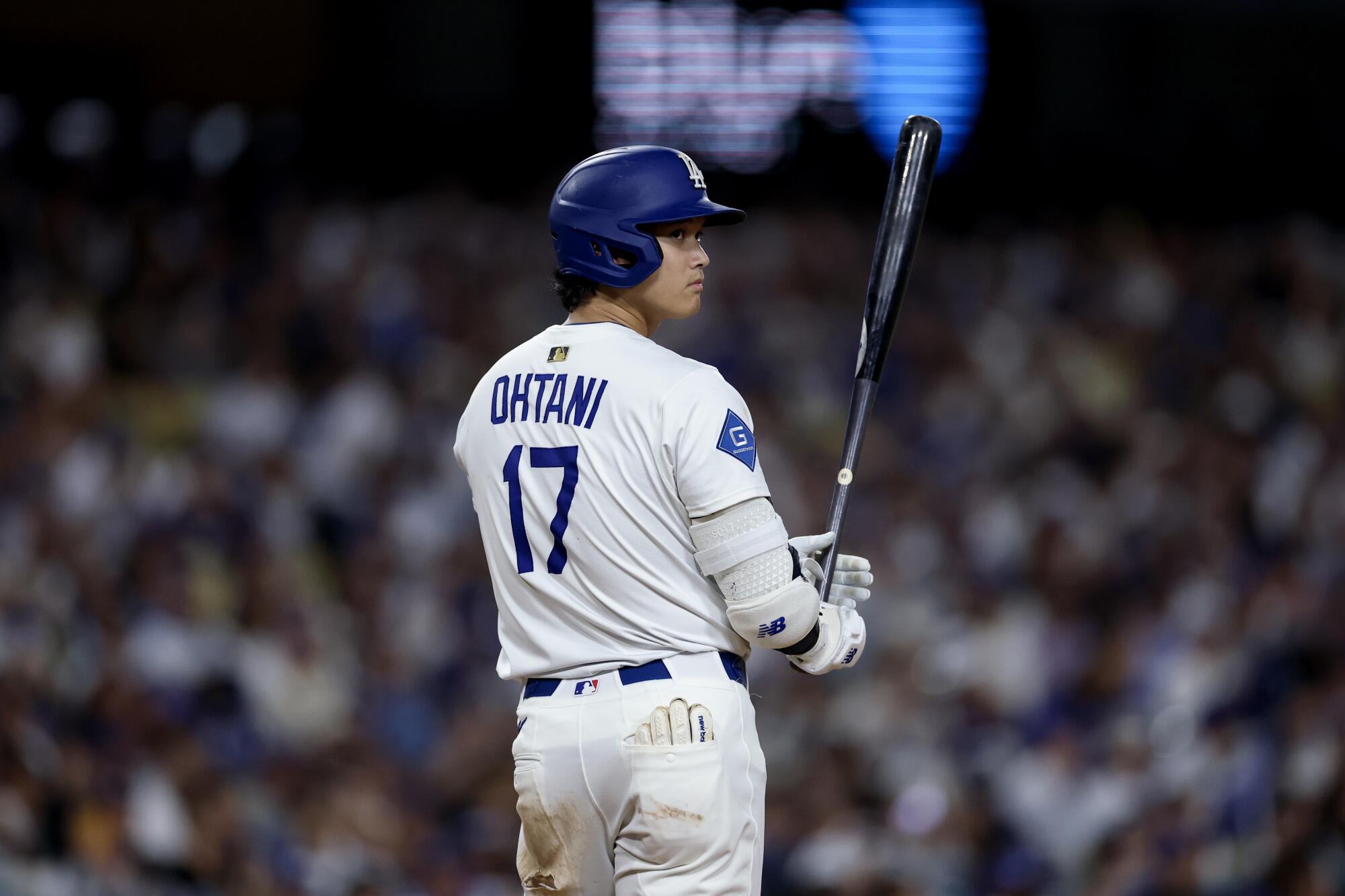 Dodgers designated hitter Shohei Ohtani prepares to bat during the sixth inning of a game against the Rockies.